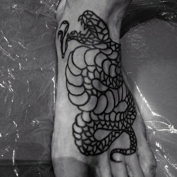 Detailed old style snake black ink tattoo on foot