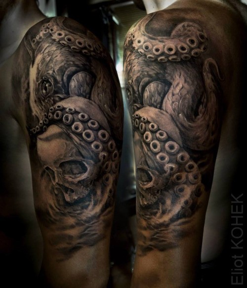 Detailed upper arm tattoo of octopus with human skull