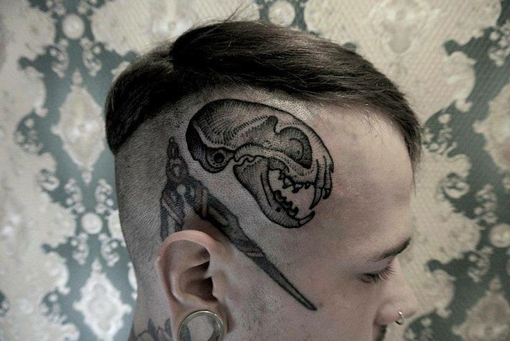Tatuagem de cabeça de tinta preta estilo ponto de caveira de animal