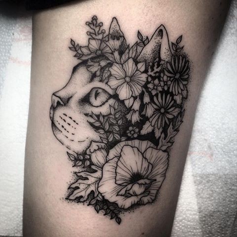 Dot style impressive looking tattoo of cat head with beautiful flowers