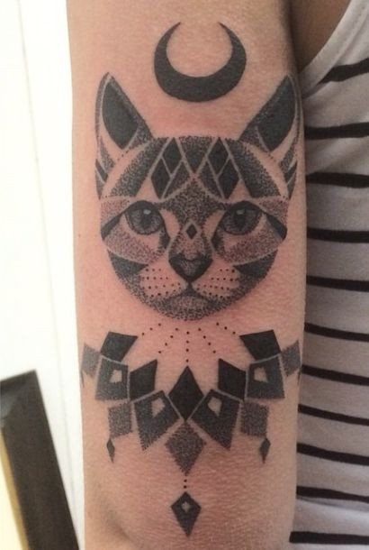 Dot style nice painted arm tattoo of cat with nice ornaments and moon symbol