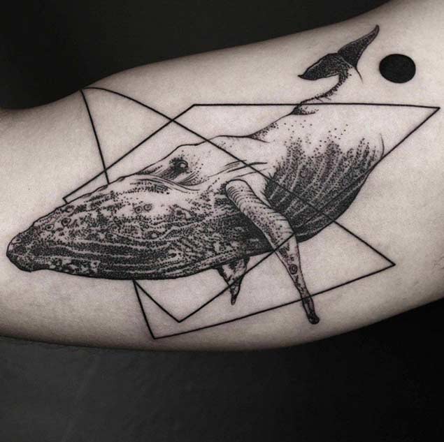 Dot style painted black ink whale tattoo combined with geometrical figures