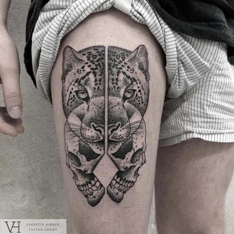 Dot style typical designed by Valentin Hirsch thigh tattoo of split leopard and human skull