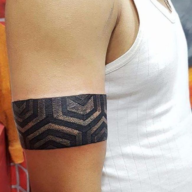 Dotwork style cool painted upper arm tattoo of stunning band