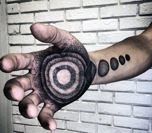 Dotwork style creative painted arm tattoo of planet parade