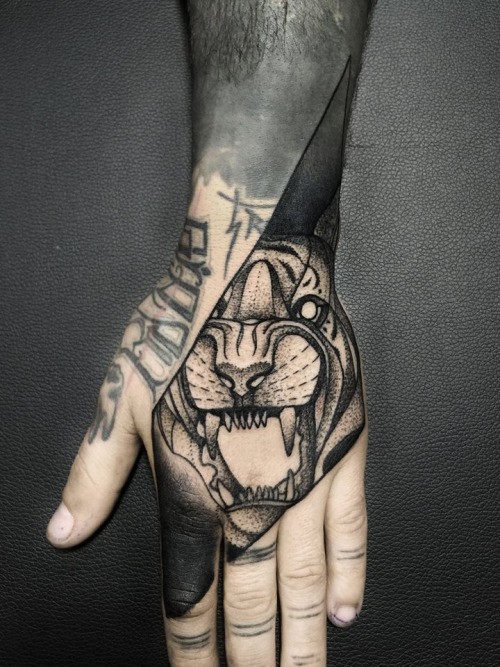 Dotwork style nice painted by Michele Zingales hand tattoo of tiger head