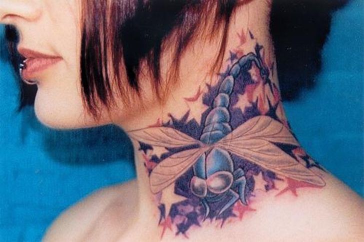 Dragonfly tattoo on neck for girls