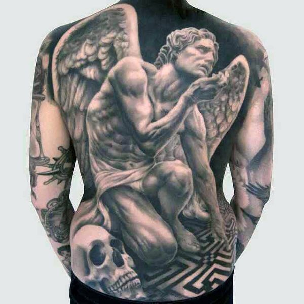 Dramatic black and white big sad angel tattoo on whole back combined with human skull