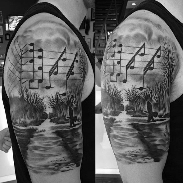 Dramatic black and white lonely musician with notes shoulder tattoo