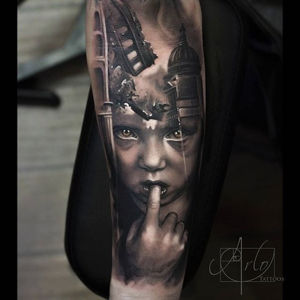 Dramatic black ink forearm tattoo of sad girl with famous buildings