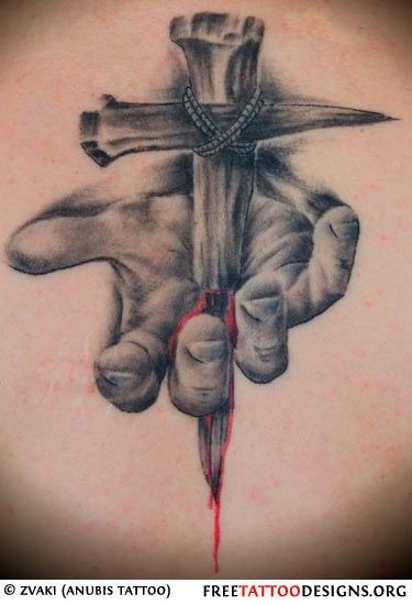 Dramatic Christian themed colored bloody hand tattoo on back