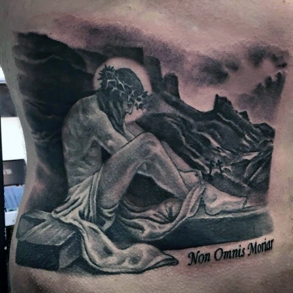 Dramatic designed black and gray style Jesus with cross tattoo on back stylized with lettering