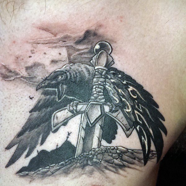 Dramatic designed black and white detailed crow with antic sword tattoo on chest