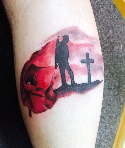 Dramatic designed colored soldier on grave with flowers arm tattoo