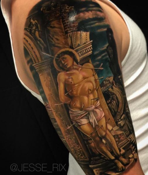 Dramatic illustrative style shoulder tattoo of wounded saint human
