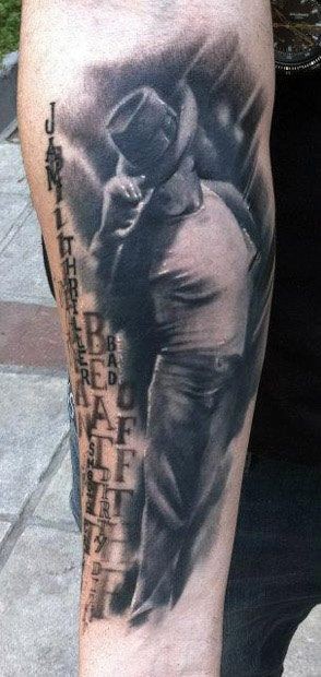 Dramatic memorial style Michael Jackson portrait with lettering tattoo on arm