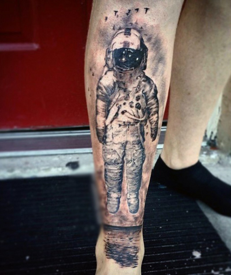 Dramatic style painted detailed black and white astronaut with flying birds tattoo on leg