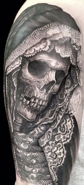 Dramatic style painted detailed skull in hood half sleeve tattoo