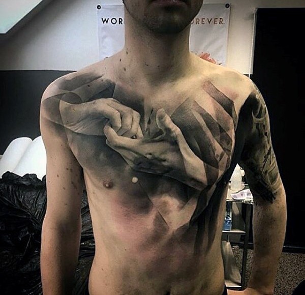 Dramatic style realistic holding hands tattoo on chest