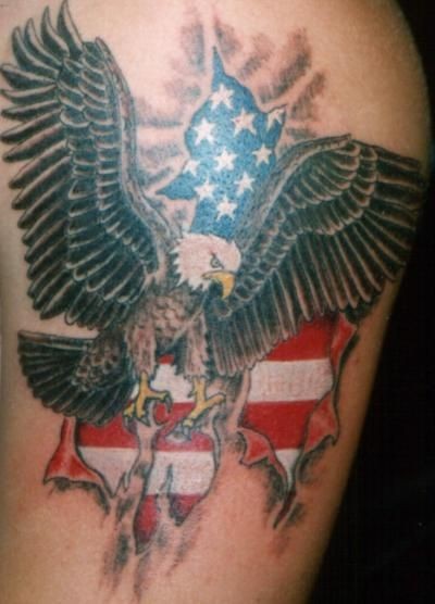 Eagle and us flag in skin rip tattoo