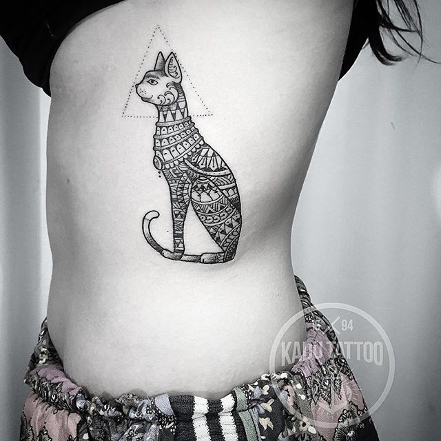 Egypt style black ink side tattoo of nice cat with triangle