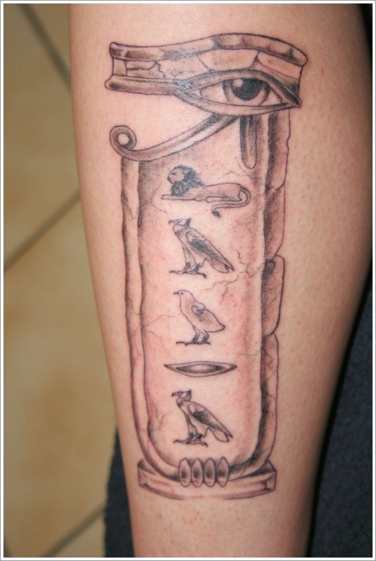 Egyptian cartouche and eye of horus tattoo