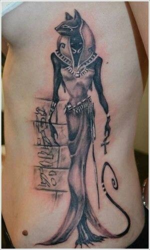 Egyptian deity bast tattoo on ribs