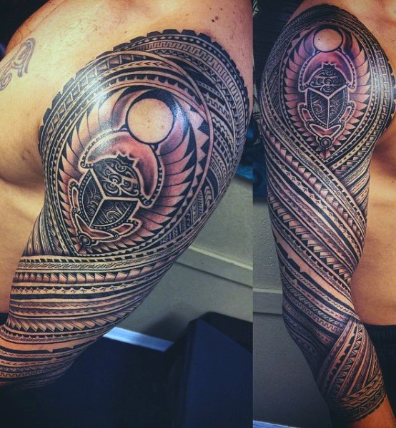 Egyptian scarab sleeve tattoo in tribal style