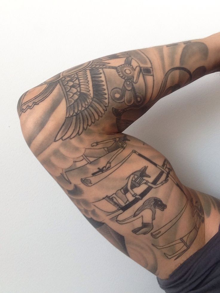 Egyptian style tattoo on whole arm