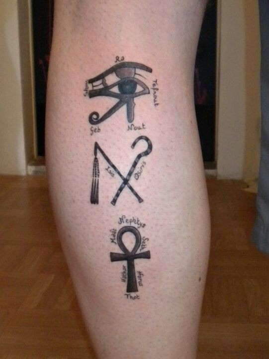 Egyptian symbols of power tattoo on leg