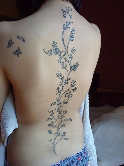 Elegant black ink lines vine tattoo on back