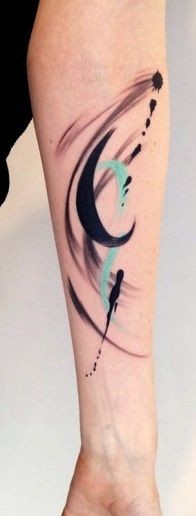 Elegant color abstraction forearm tattoo