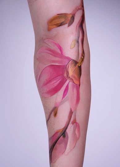 Elegant pink flowers tattoo