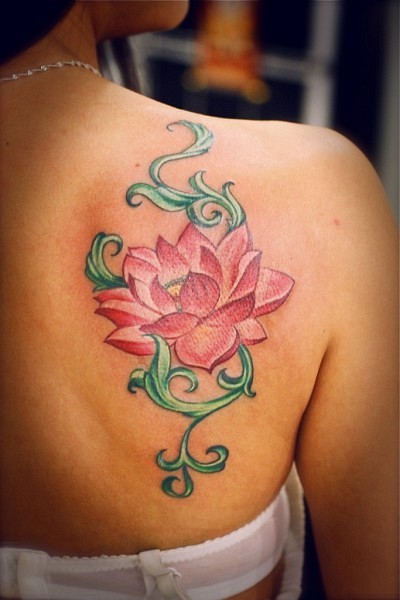 Elegant pink lotus tattoo on back for girls