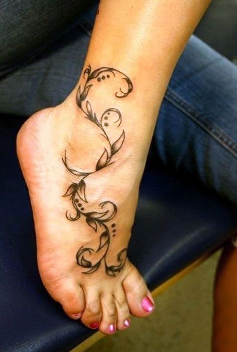 Elegant vine tattoo on foot