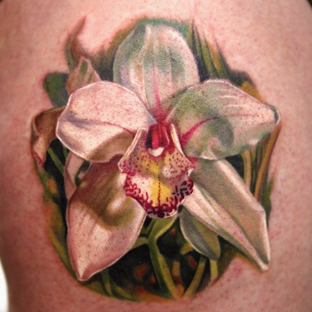 Elegant white single orchid tattoo