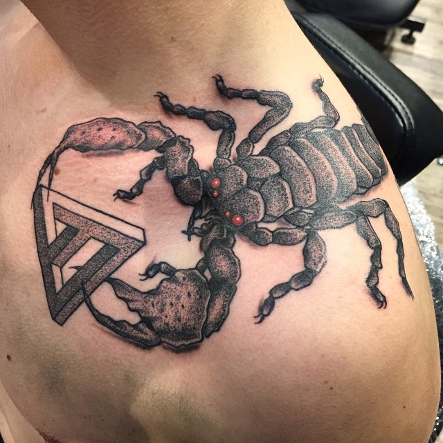 Engraving like 3D colored shoulder tattoo of demonic scorpion with mystic symbol