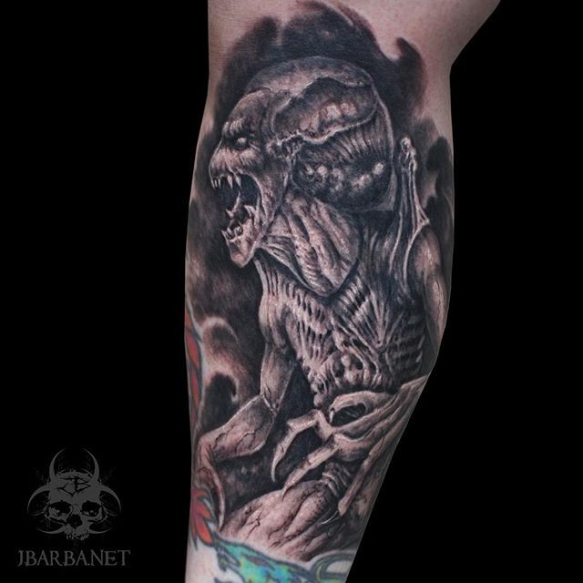 Engraving style black ink arm tattoo of creepy monster
