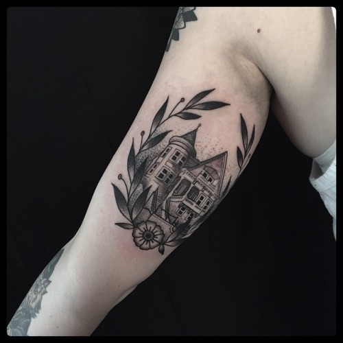 Engraving style black ink arm tattoo of big house with leaves