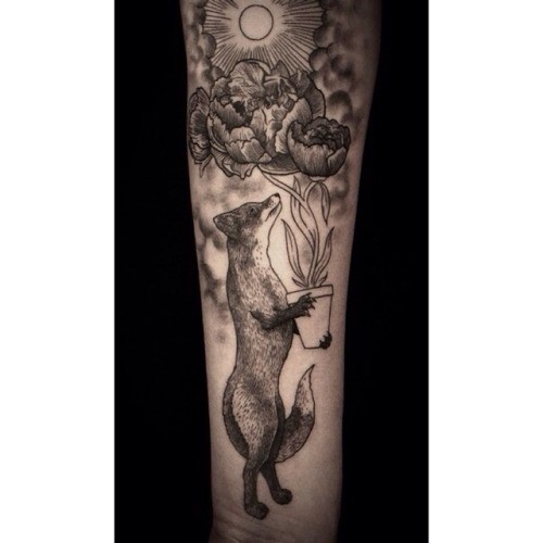 Engraving style black ink arm tattoo of fox with beautiful flowers with plant and sun