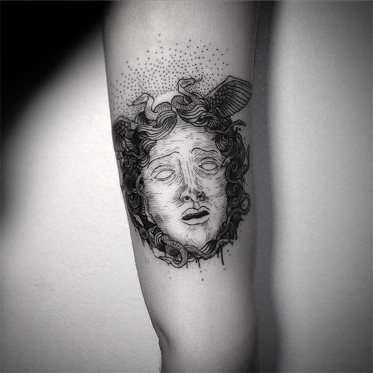 Engraving style black ink arm tattoo of Medusa head