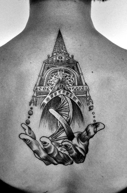 Engraving style black ink back tattoo of large medieval cathedral with DNA and human hand