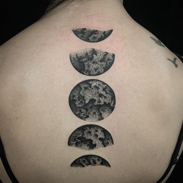 Engraving style black ink back tattoo of cool looking moon