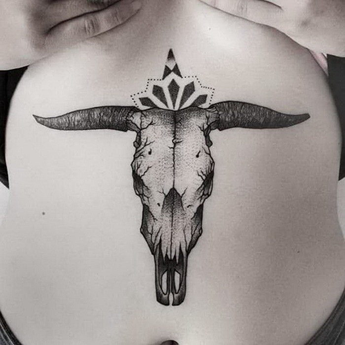 Engraving style black ink belly tattoo of cow skull