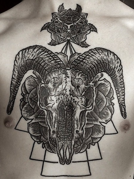 Engraving style black ink chest tattoo of animal skull with flowers