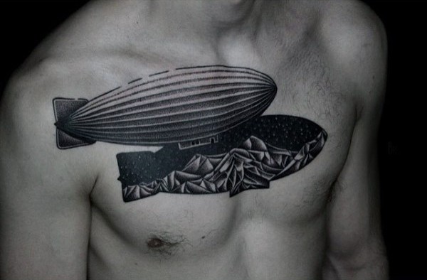 Engraving style black ink chest tattoo of big airship