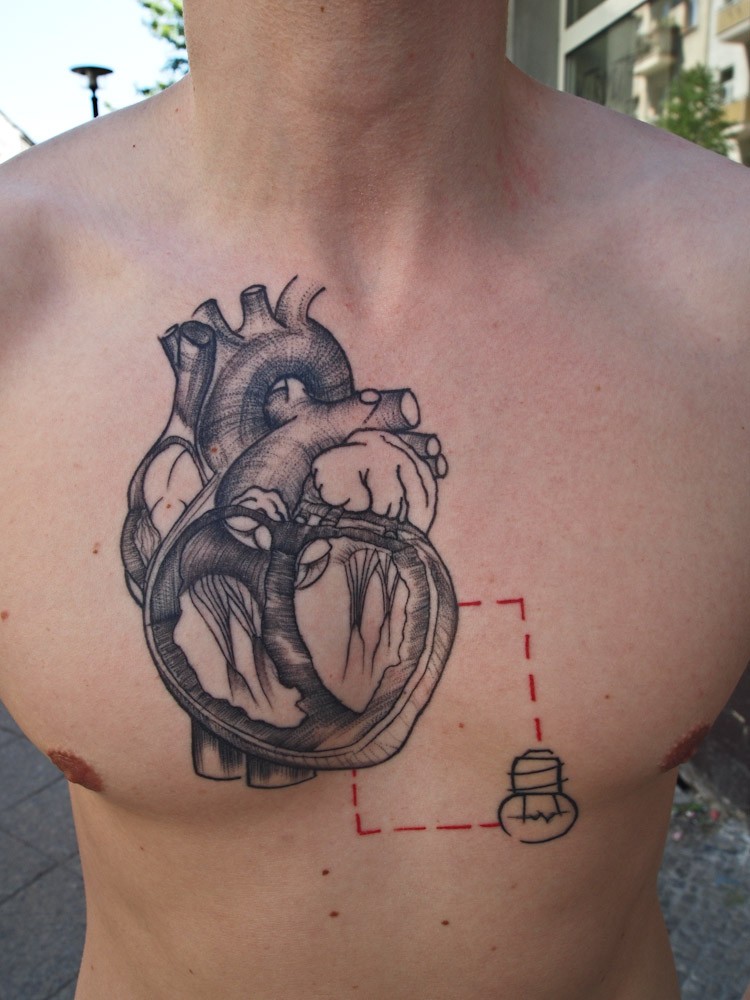 Engraving style black ink chest tattoo of human heart with small bulb and square