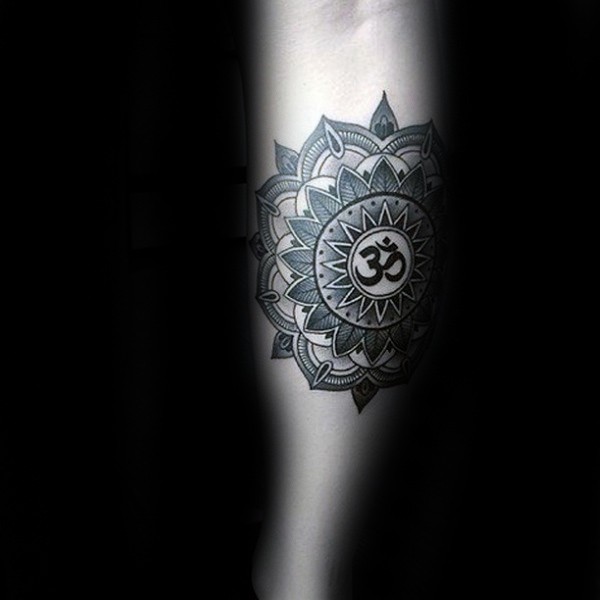 Engraving style black ink forearm tattoo of Hinduism symbol with flower