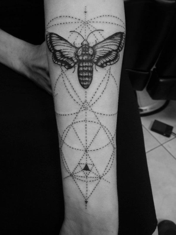 Engraving style black ink forearm tattoo of butterfly with ornaments