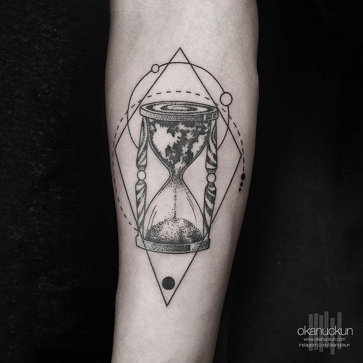 Engraving style black ink forearm tattoo of big sand clock with geometrical figures